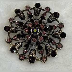 Large gold tone purple floral brooch purple and pink stones. Brooch, pendant